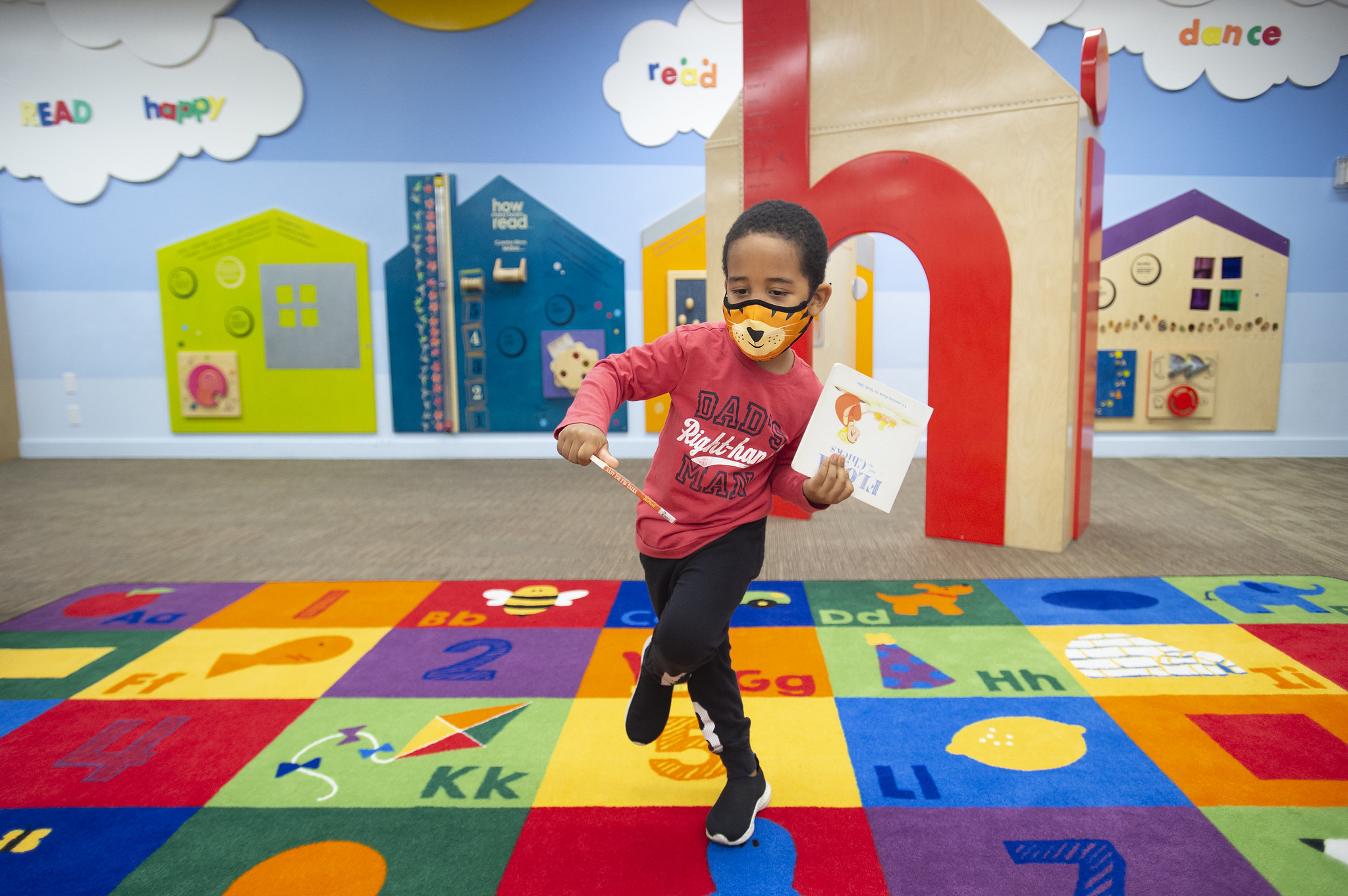 A child plays games at his school.